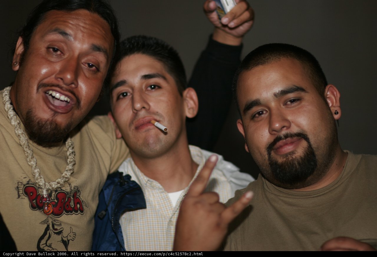 Three Men Strike A Pose