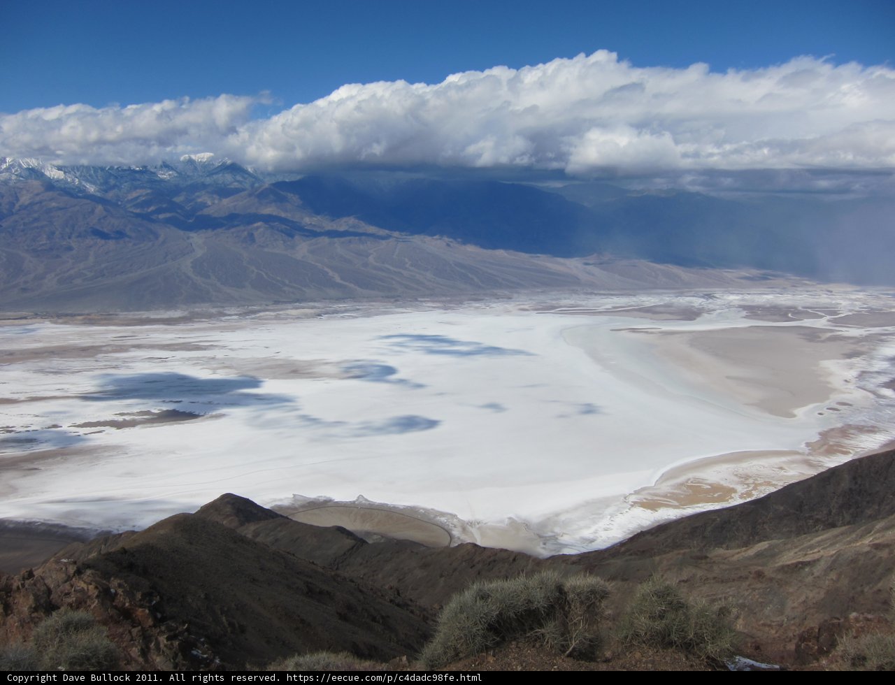 Majestic Mountains and Serene Lake in the Desert