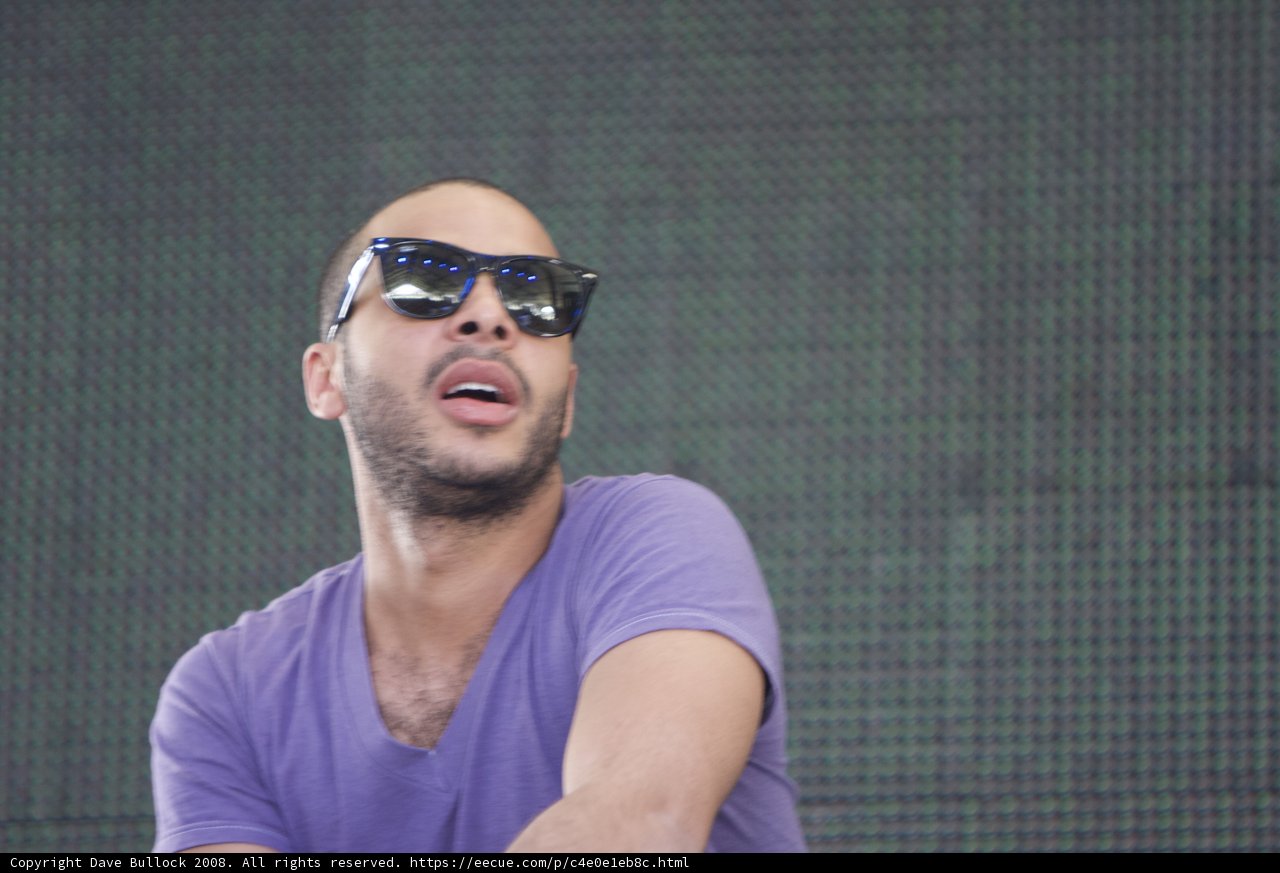 Portrait of DJ Mehdi in Sunglasses and Purple Shirt
