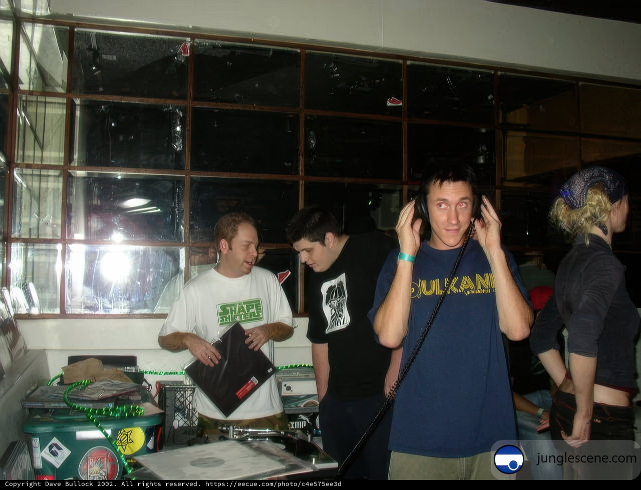 Group of People at DJ Table