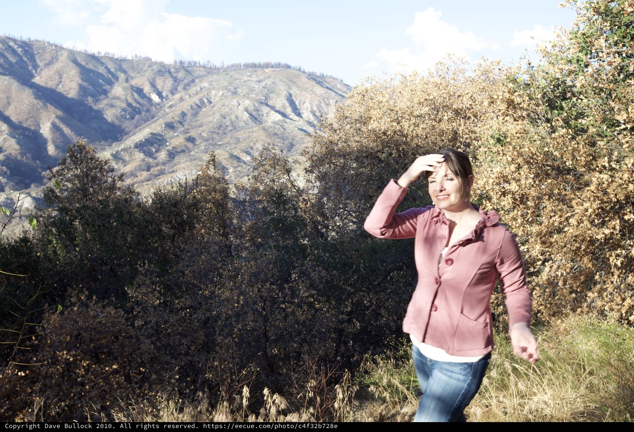 Woman Shielding Eyes in Southern California Mountains