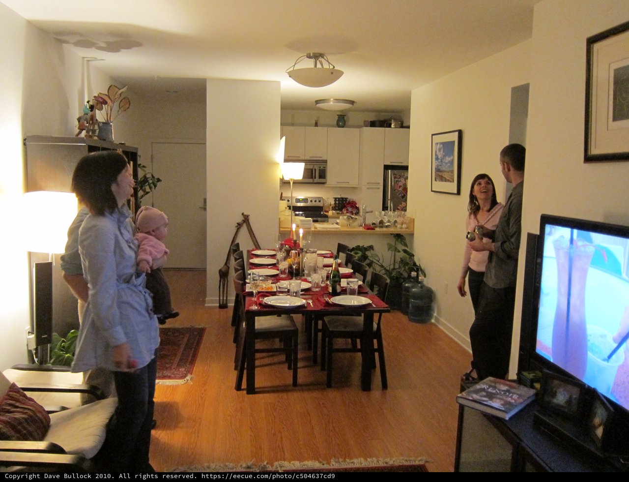 Family Gathers for Hanukkah Dinner Party Celebration
