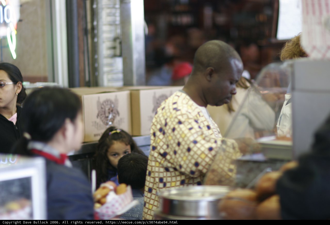 A Man Enjoying Lunch at the Food Court