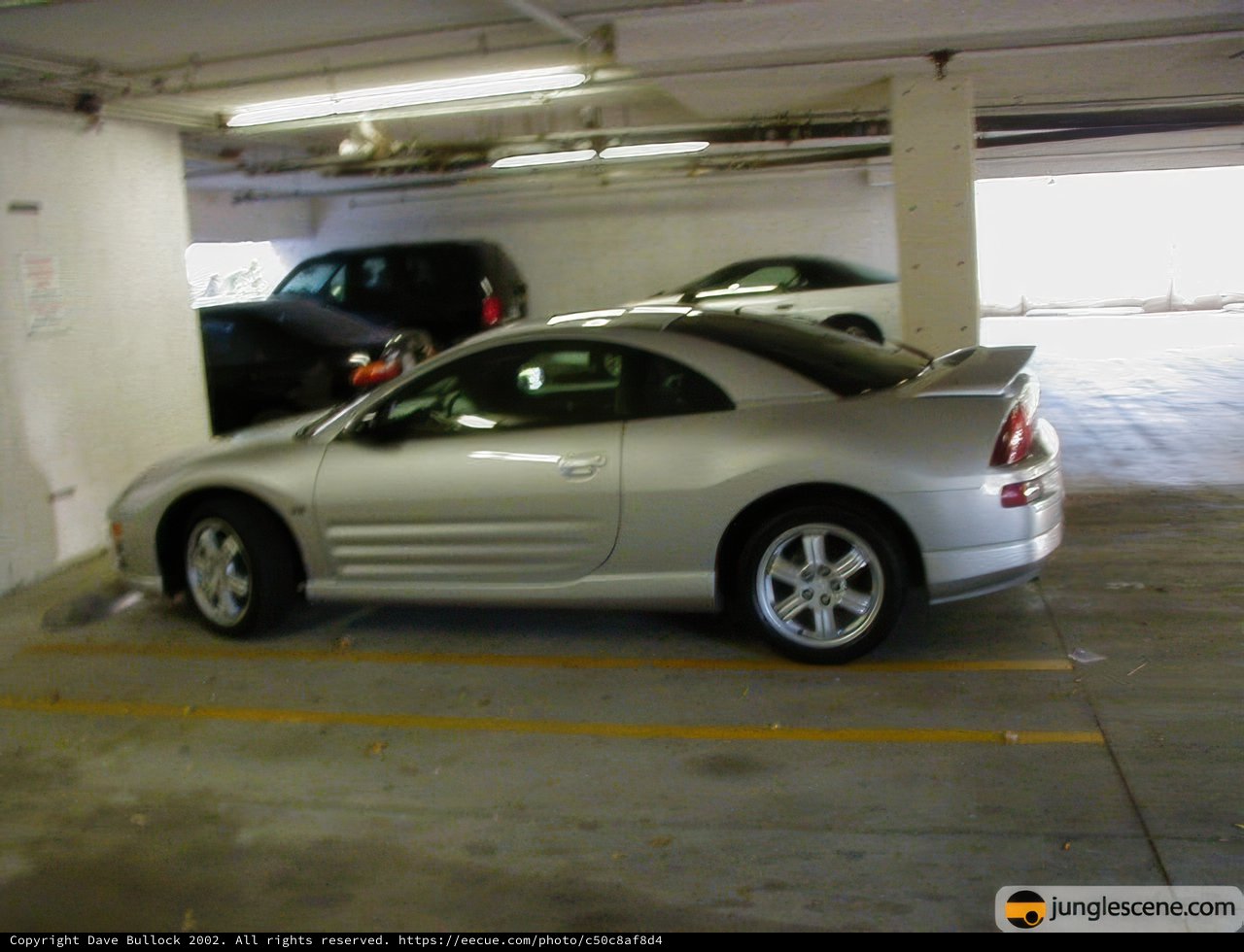 Parked Sports Car in Silver Alloy Wheel Rim