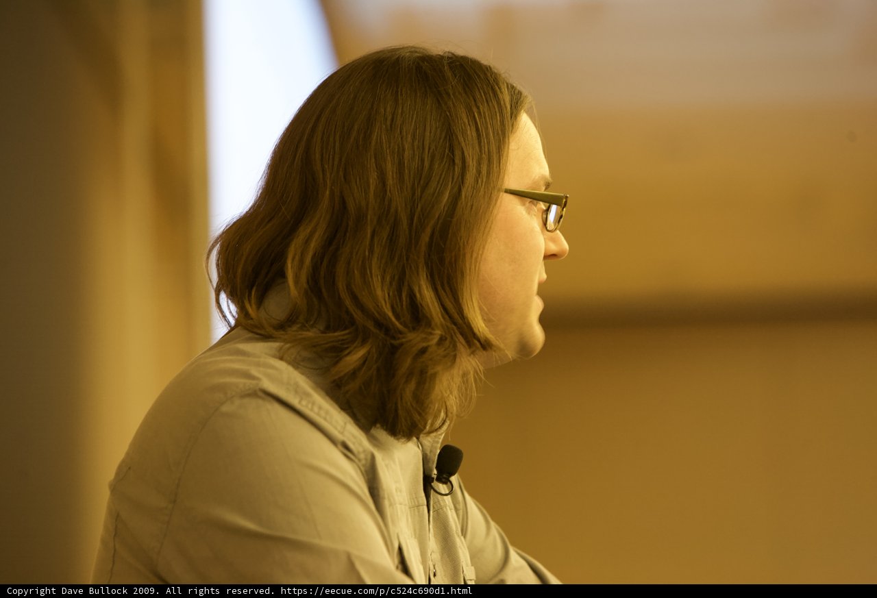 Portrait of a Glasses-Wearing Man with Long Hair at DEFCON 17