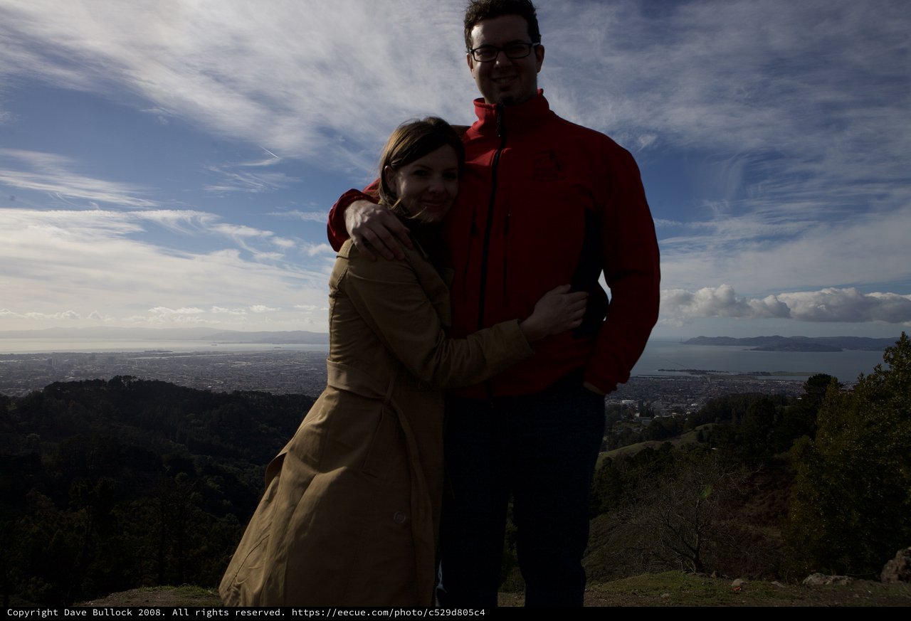 Couple Embracing at Scenic Bay Overlook