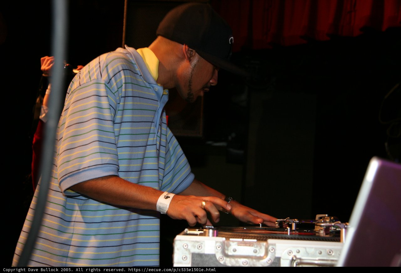 Blue-Shirted Man Rocks the Turntables
