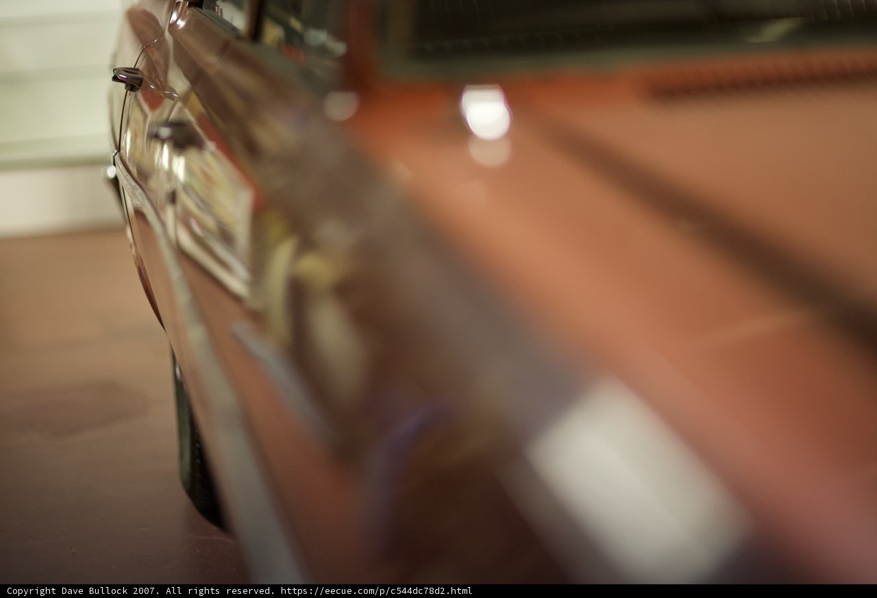The Spokes of a Classic Sports Car