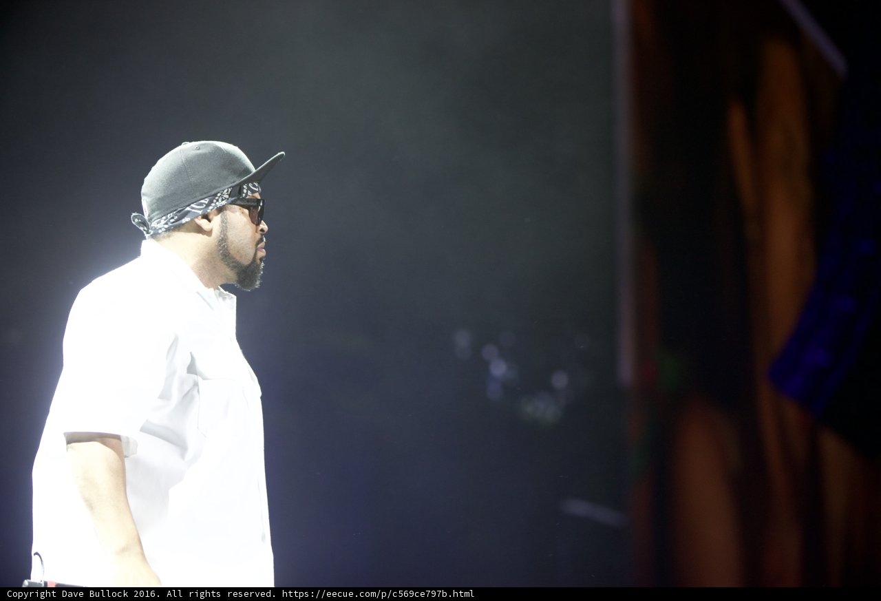 Man with a White Hat on Stage