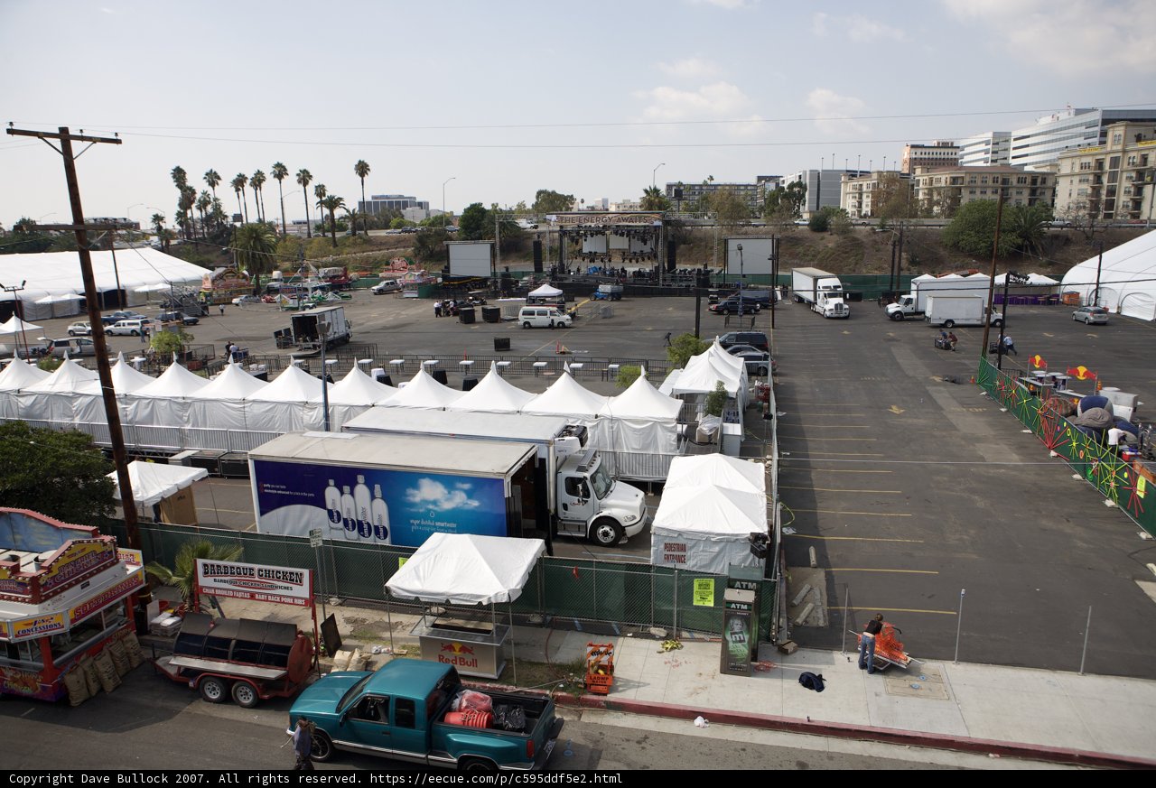 Trucks and Tents in a Busy Parking Lot