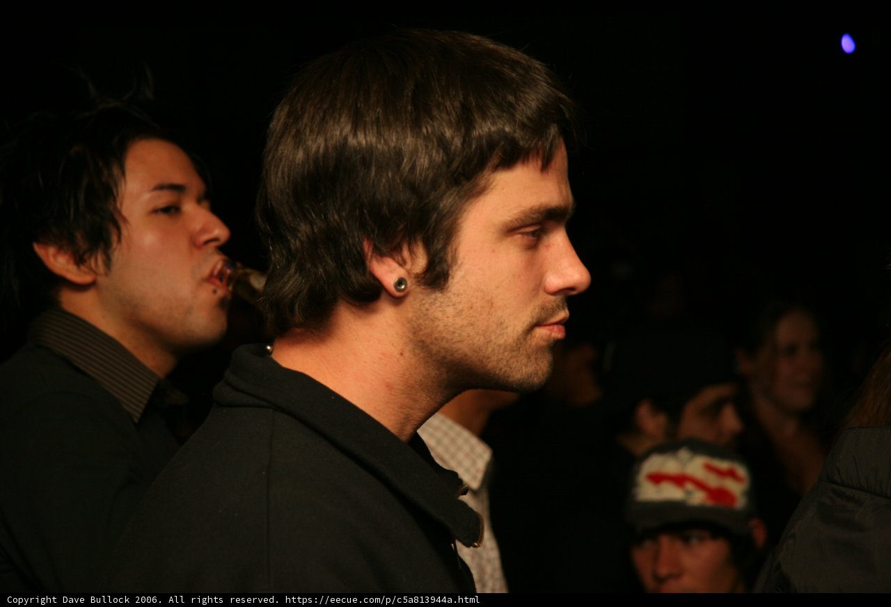 Man in Black Baseball Cap