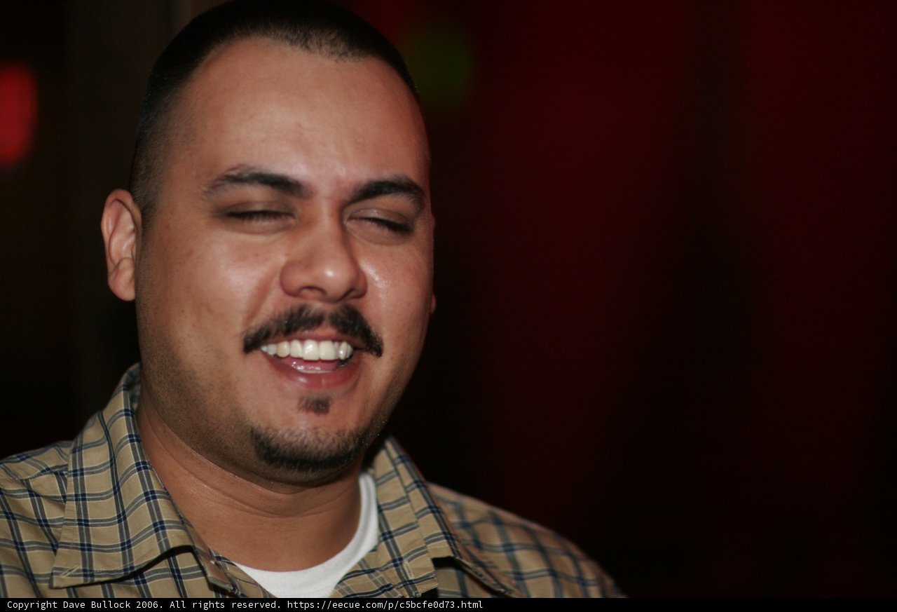 The Joyful Mustached Man