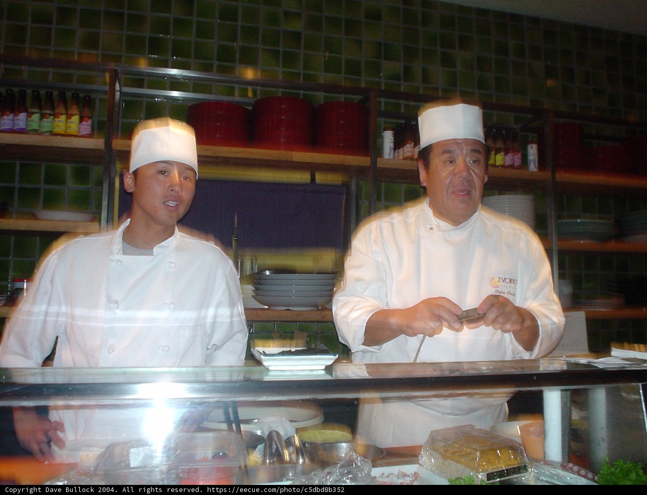 Two Chefs in Deli Shop Uniforms