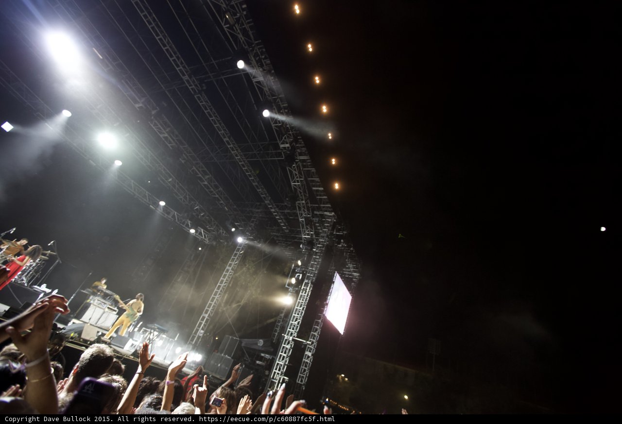 FYF Fest Wide Stage Scaffolding Spotlight Beams Video Screen Crowd Arms Night