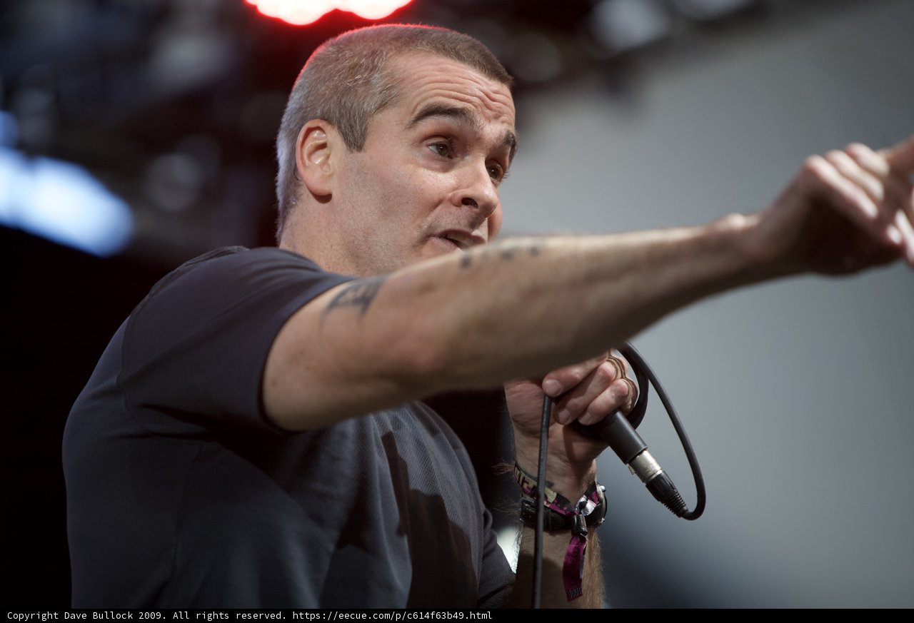 Henry Rollins takes the stage with a microphone at Coachella 2009