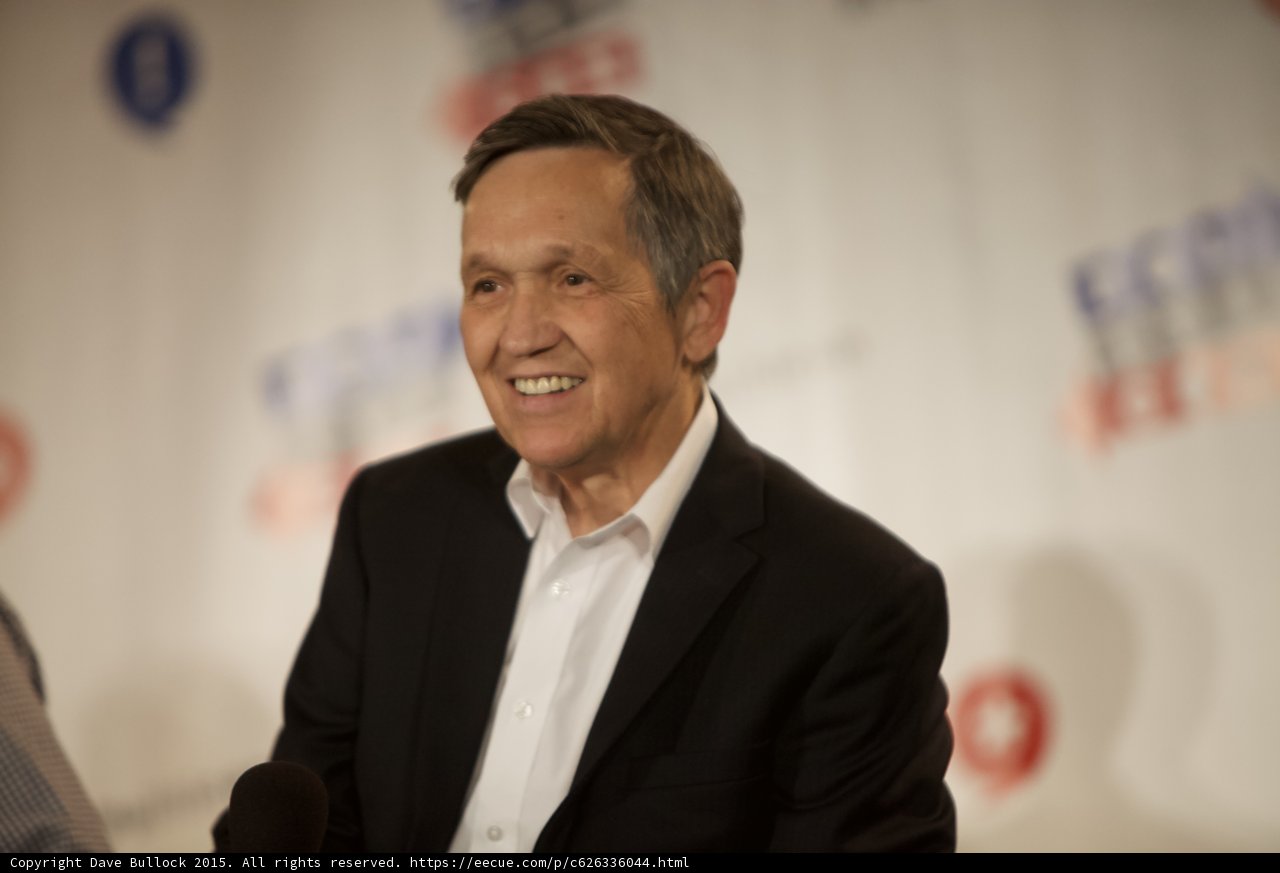 Smiling Politician at a Press Conference