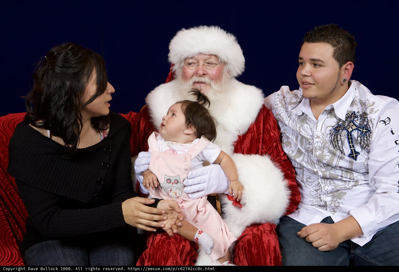 A Festive Family Portrait with Santa Claus