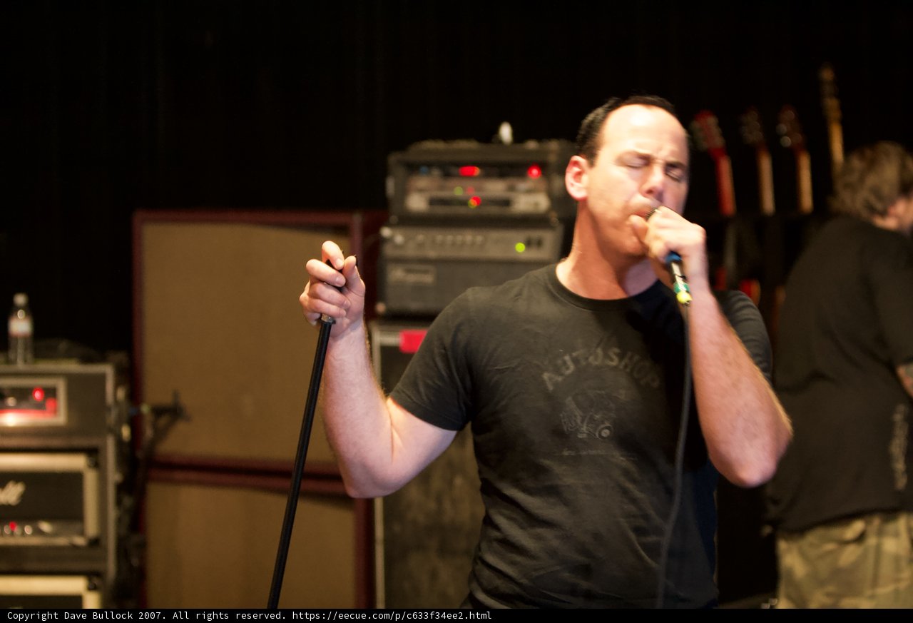 Live performance by a singer with a Microphone