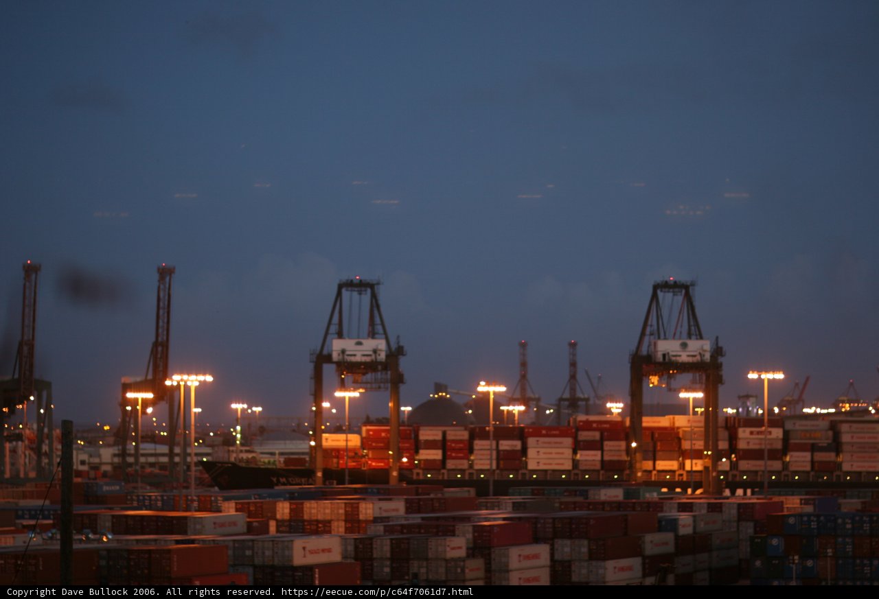 Nighttime Cargo Ships at the Waterfront