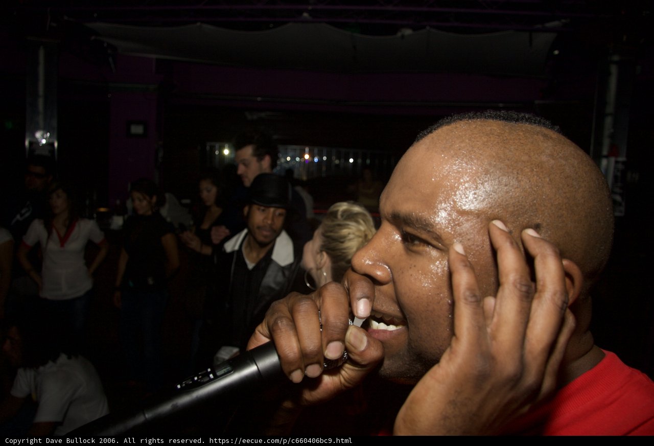 Shaved Head and a Microphone