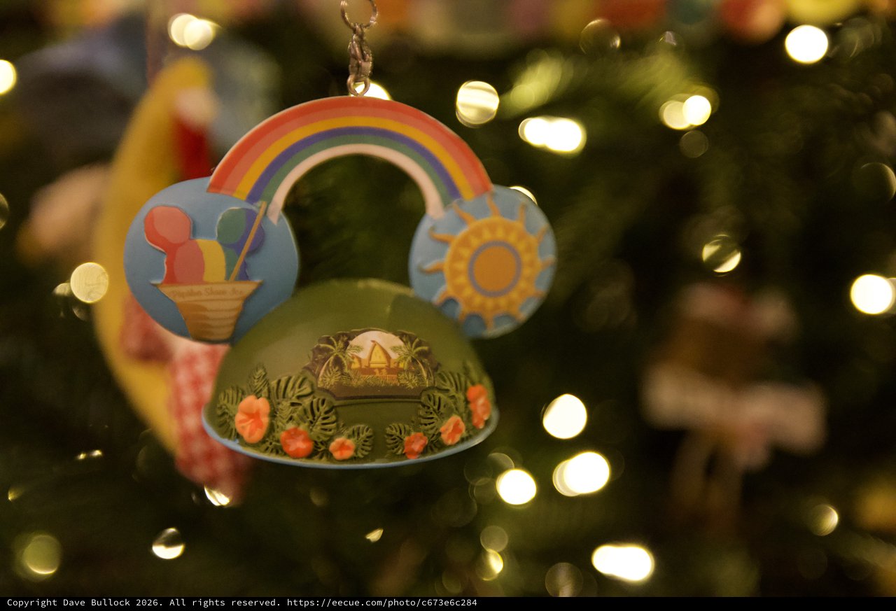 Whimsical Rainbow Christmas Ornament with Bokeh Lights