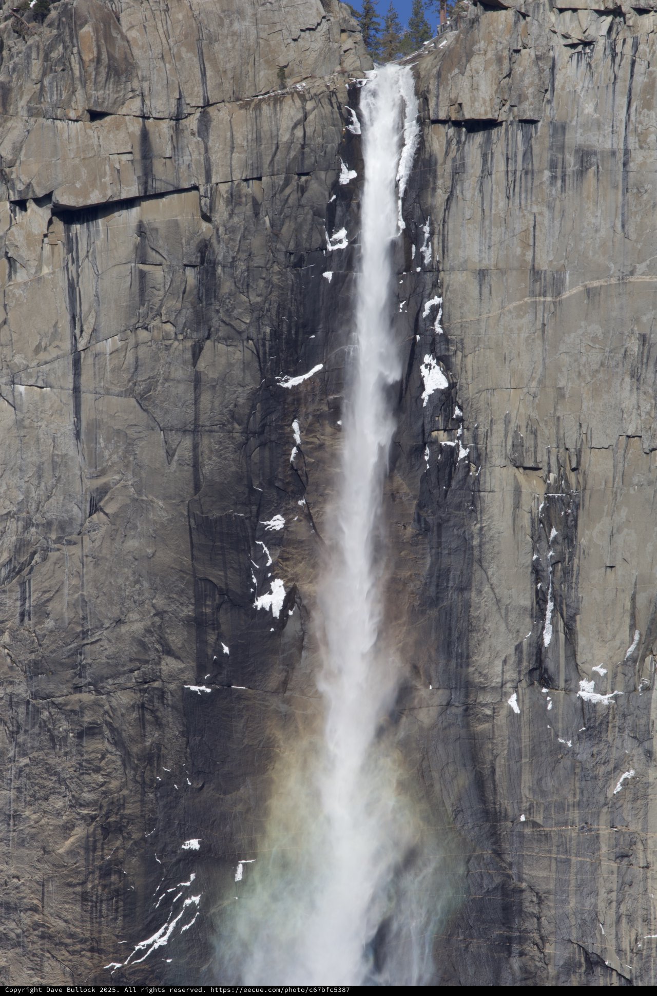 Yosemite Valley Waterfall Cascading Down Granite Cliff Face
