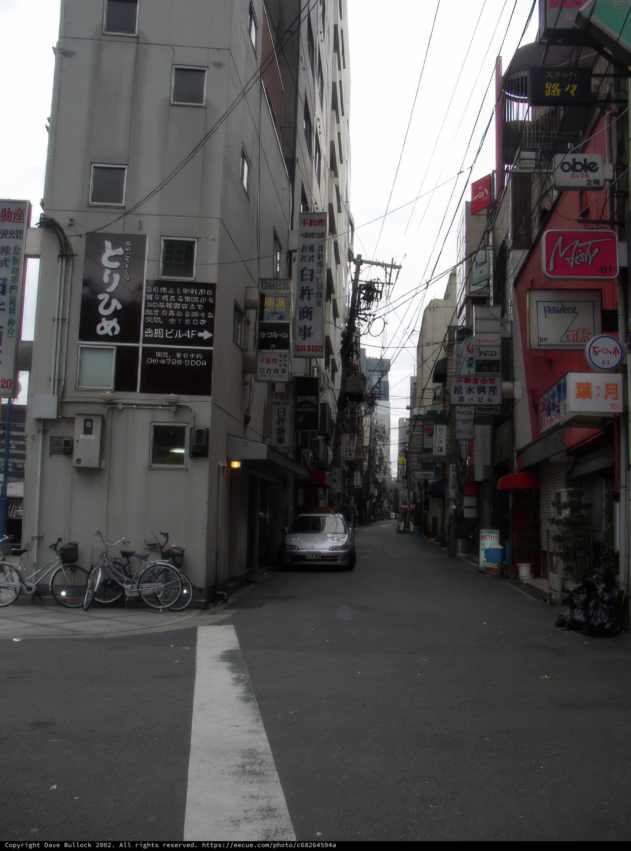 Parked Bike on Busy Osaka Street