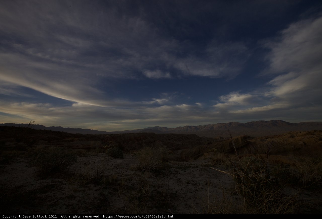 Desert Sunset over Mountain Range