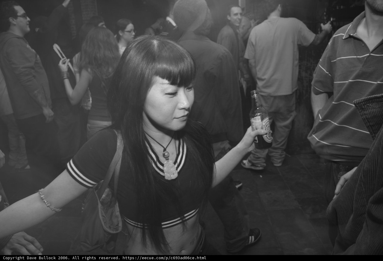 A Woman in Black and White at the Urban Club