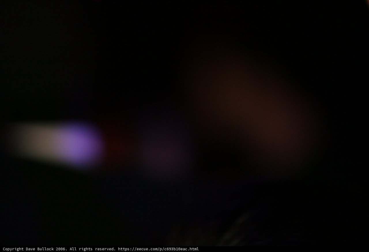 Phone Light in the Aurora Sky