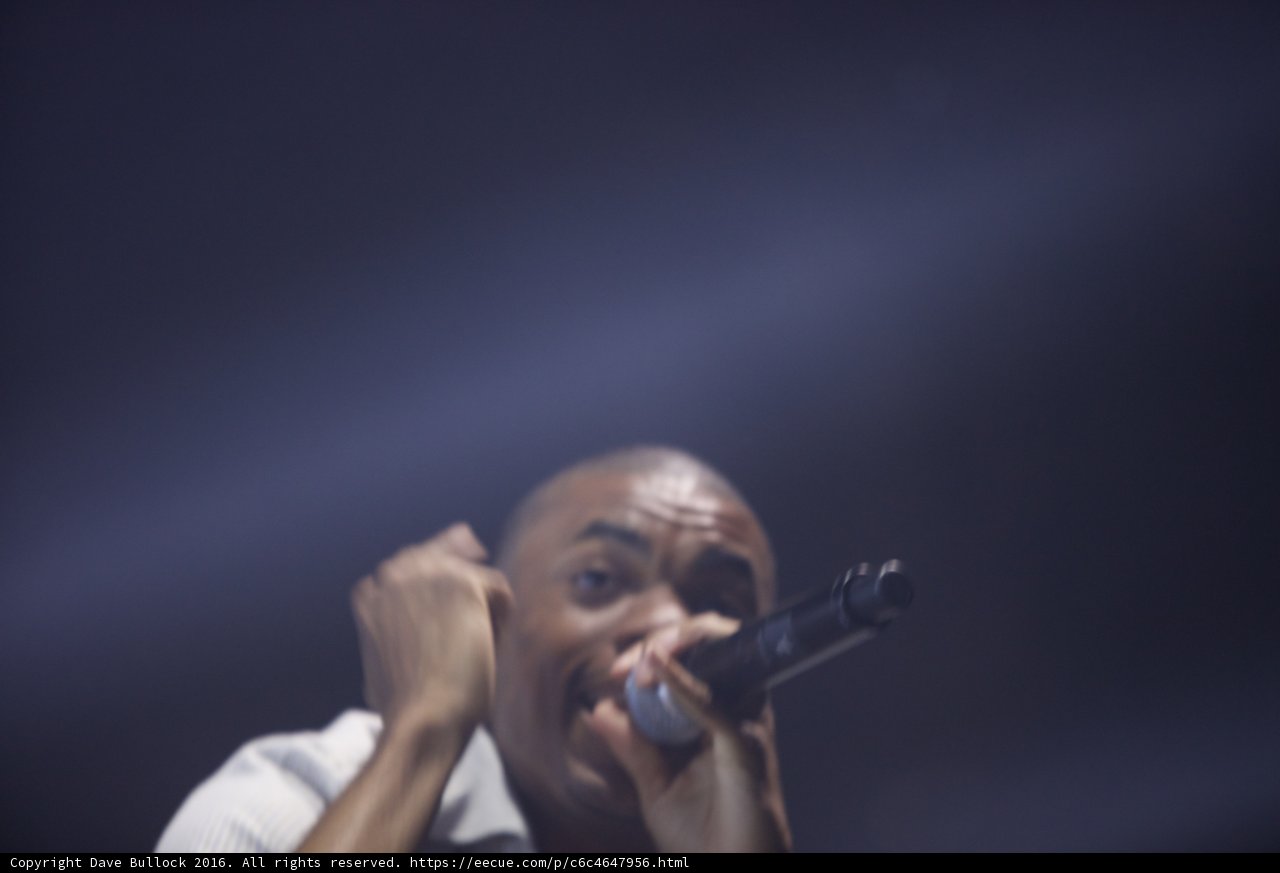 Vince Staples Takes the Stage with Microphone in Hand