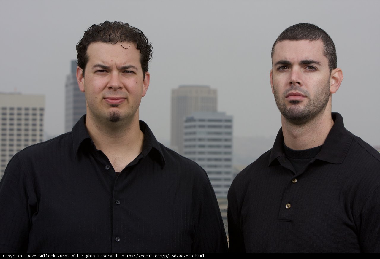 Two Happy Men with a Metropolis Background