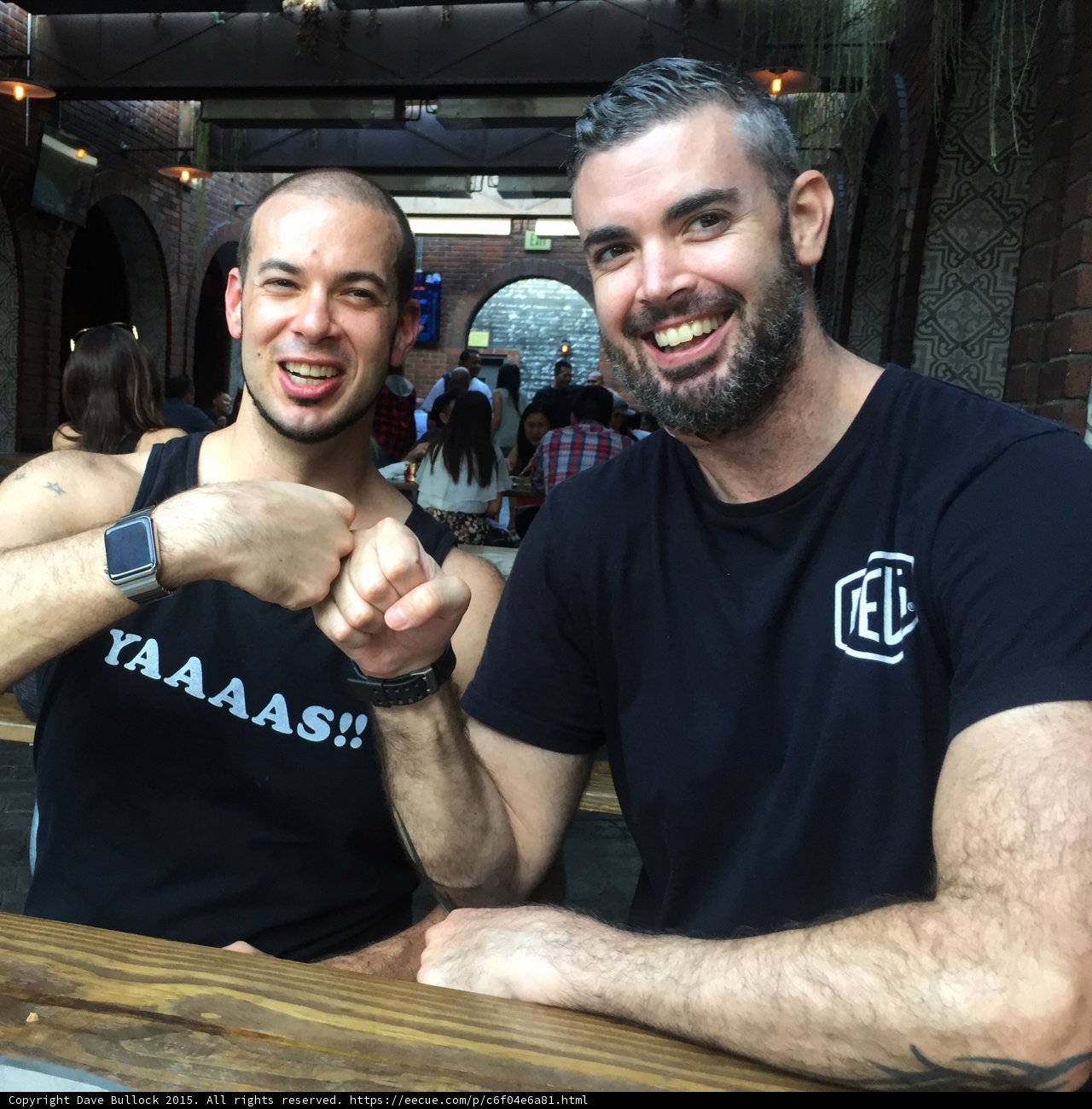 Two Brothers Enjoying a Laugh at a Local Eatery