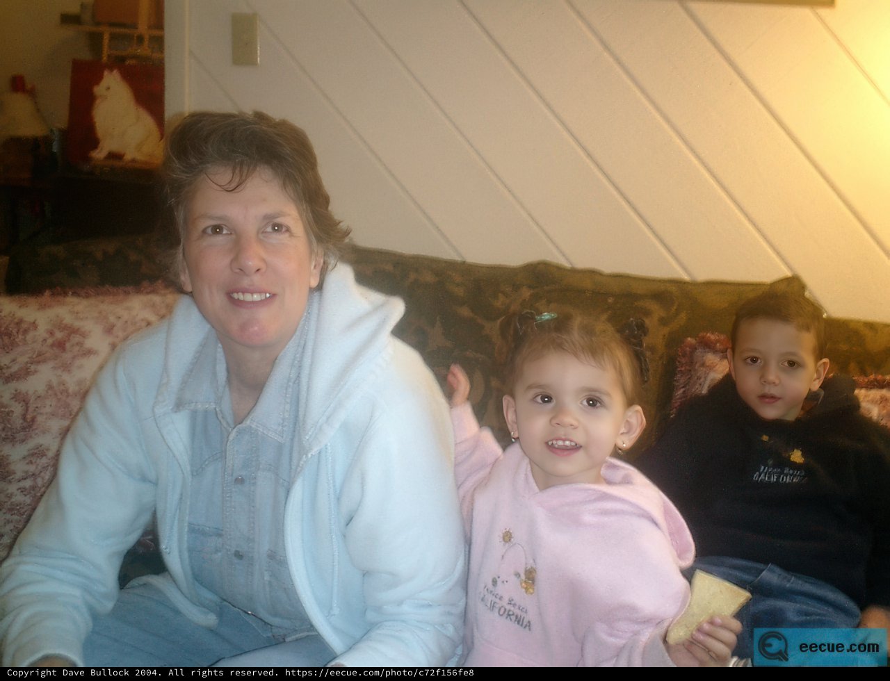 A Cozy Family Moment on the Couch in 2002
