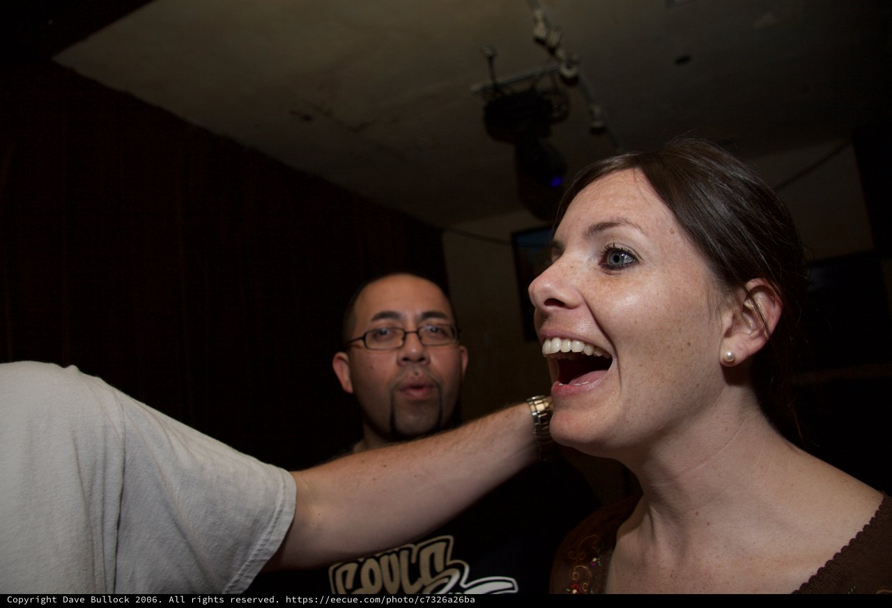 Laughing Woman Surprised at Art Walk Party