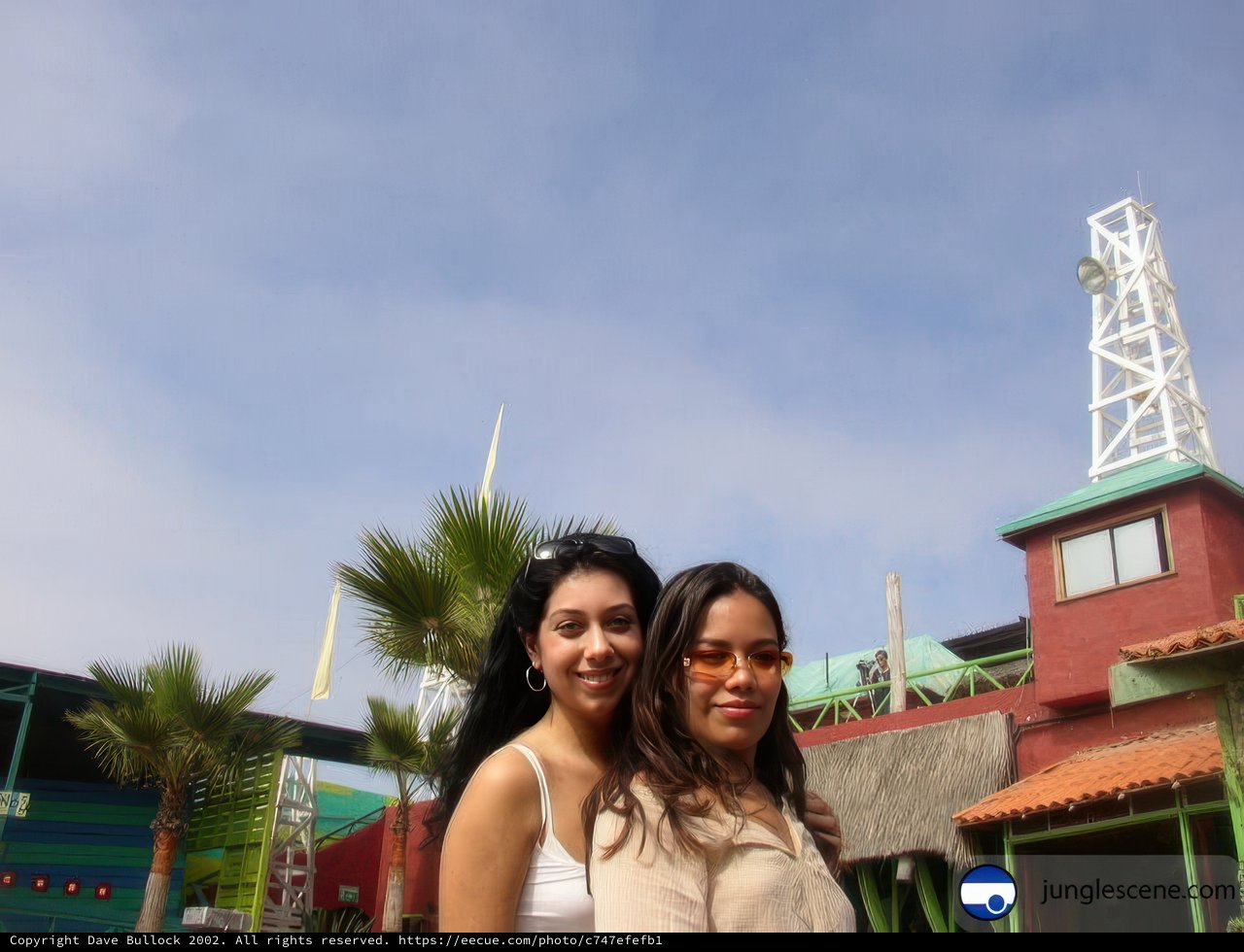 Women in front of Villa Architecture