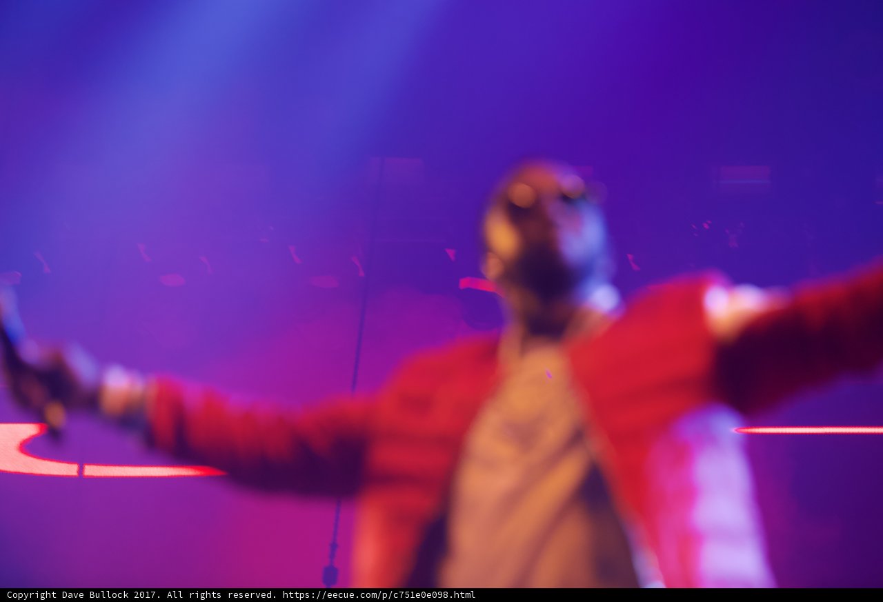 Red Coat on Purple Stage