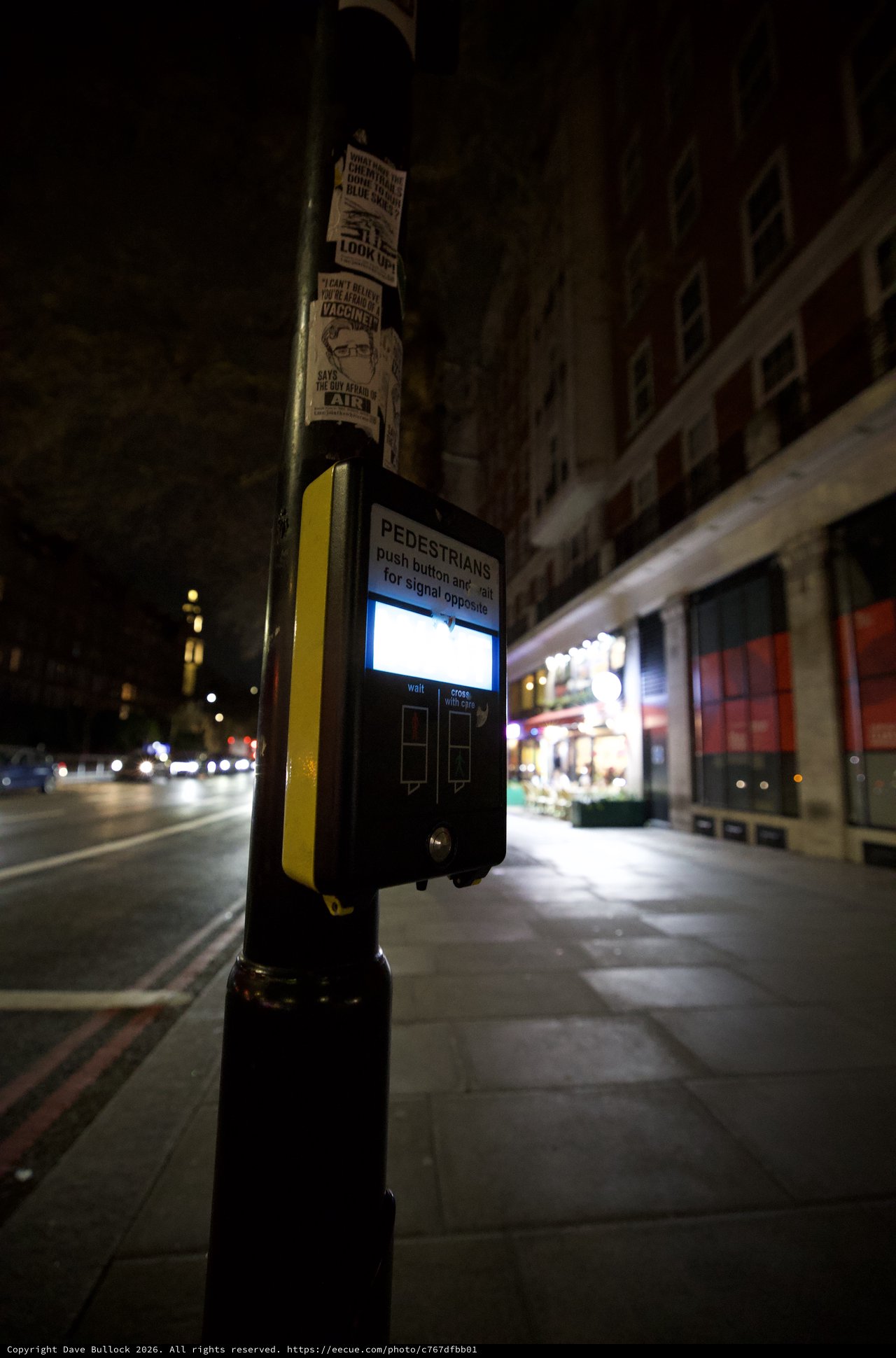 Urban Pedestrian Crossing Signal at Night in London