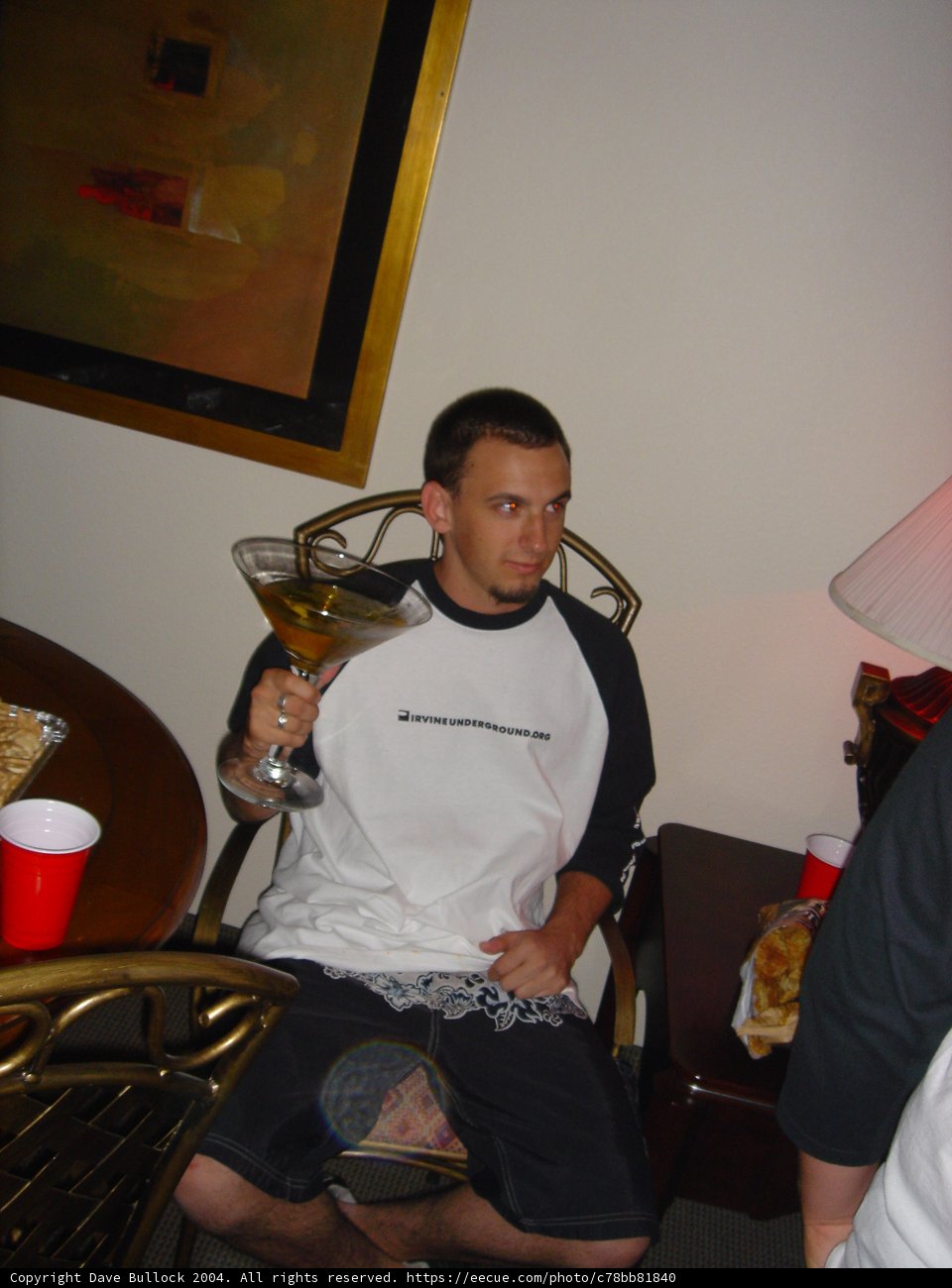 Man in Black T-Shirt Relaxing on a Armchair