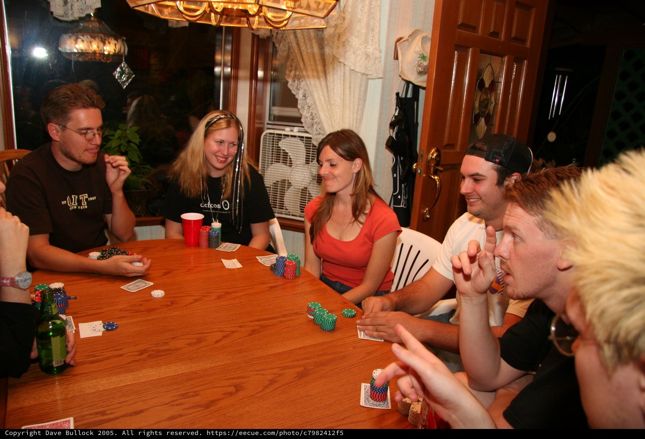 Friends Enjoy Late Night Home Poker Game