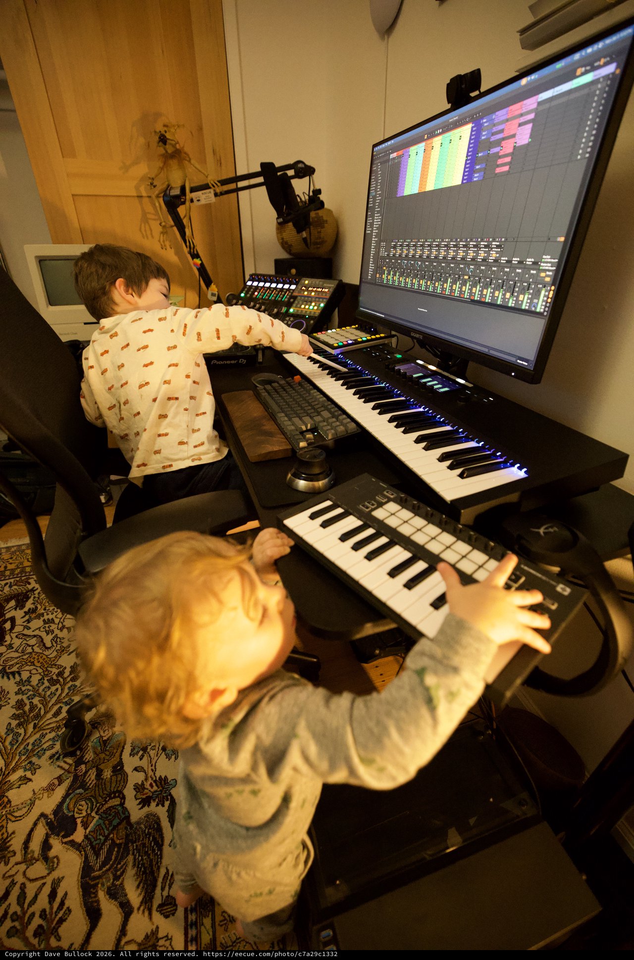 Young Brothers Making Music Together in Home Studio