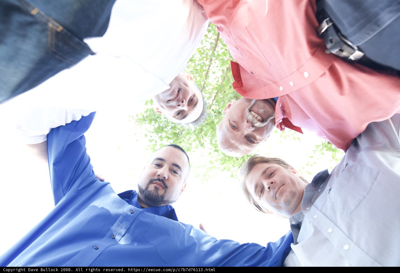 Group of Men Gathered for Wedding Ceremony