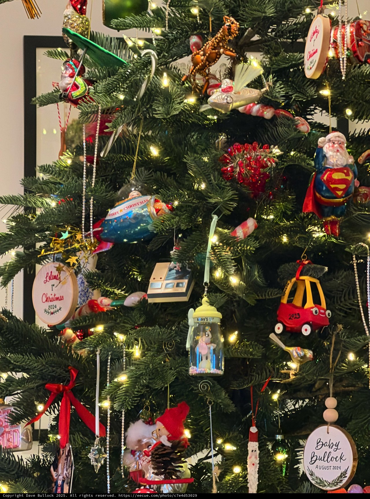 Eclectic Christmas Tree Filled with Personal Ornaments and Memories