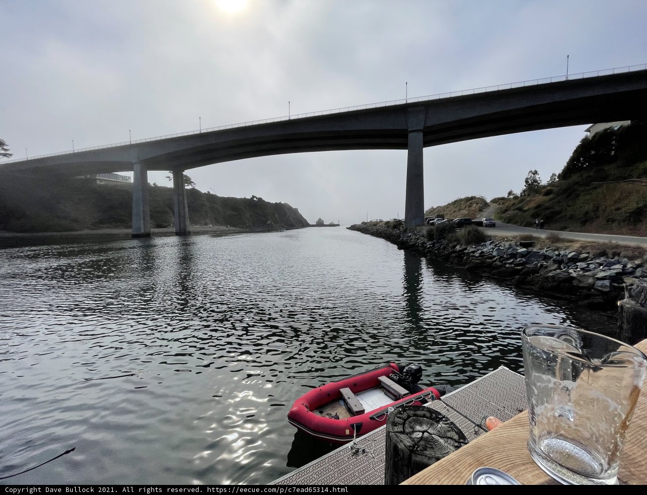 Docked Boat with Ocean View under Bridge