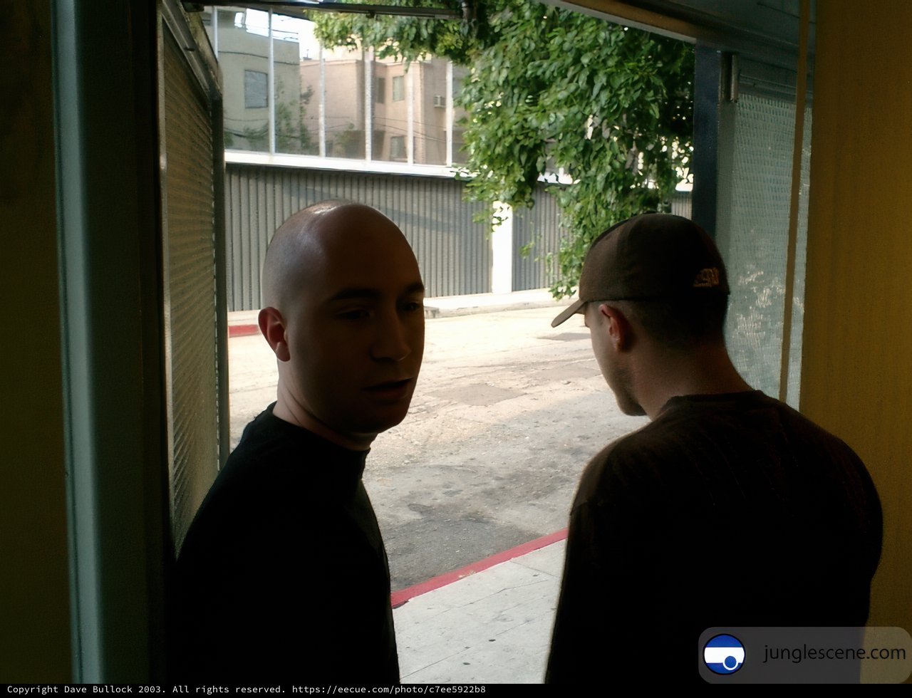 Two Men at the Urban Doorway