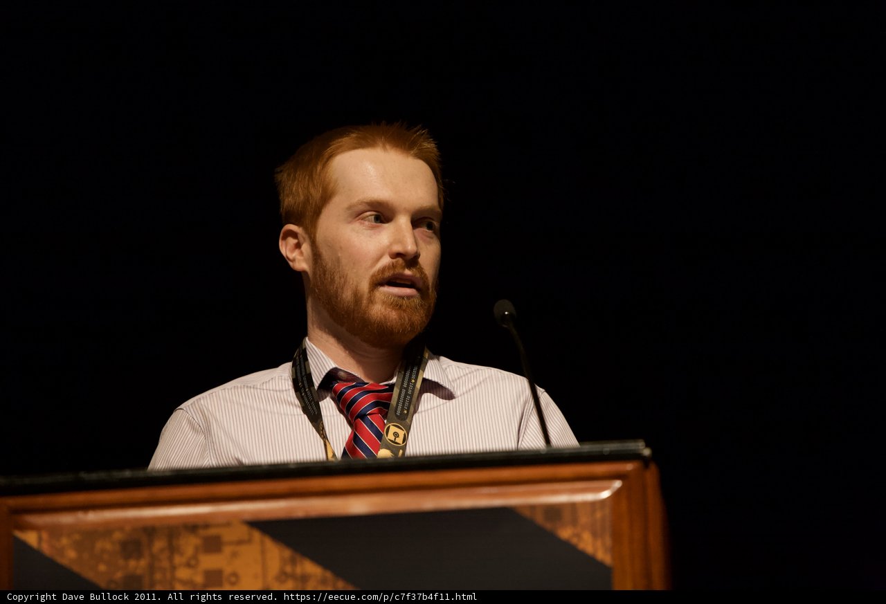 Man with Red Hair Addresses the Crowd