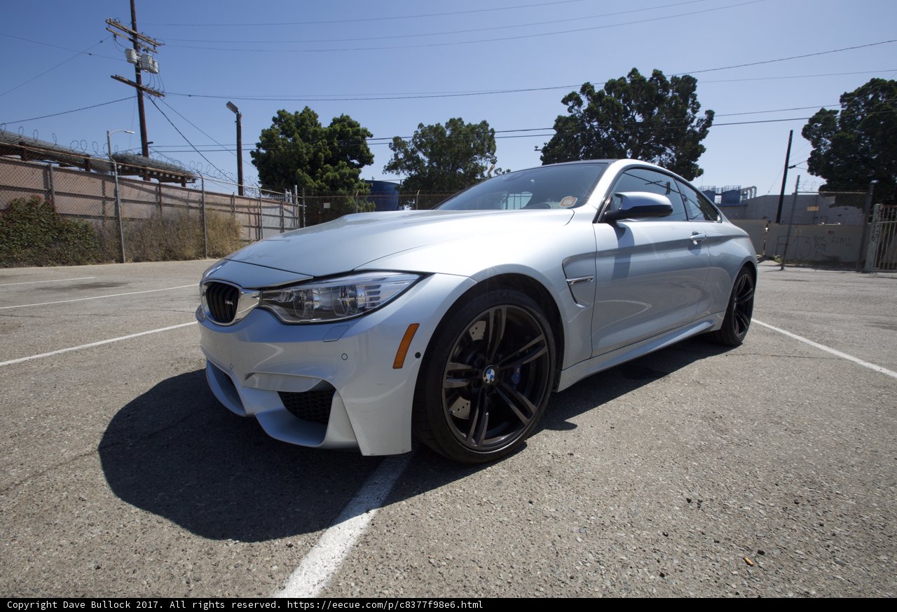 Sleek BMW M4 Coupe in Parking Lot