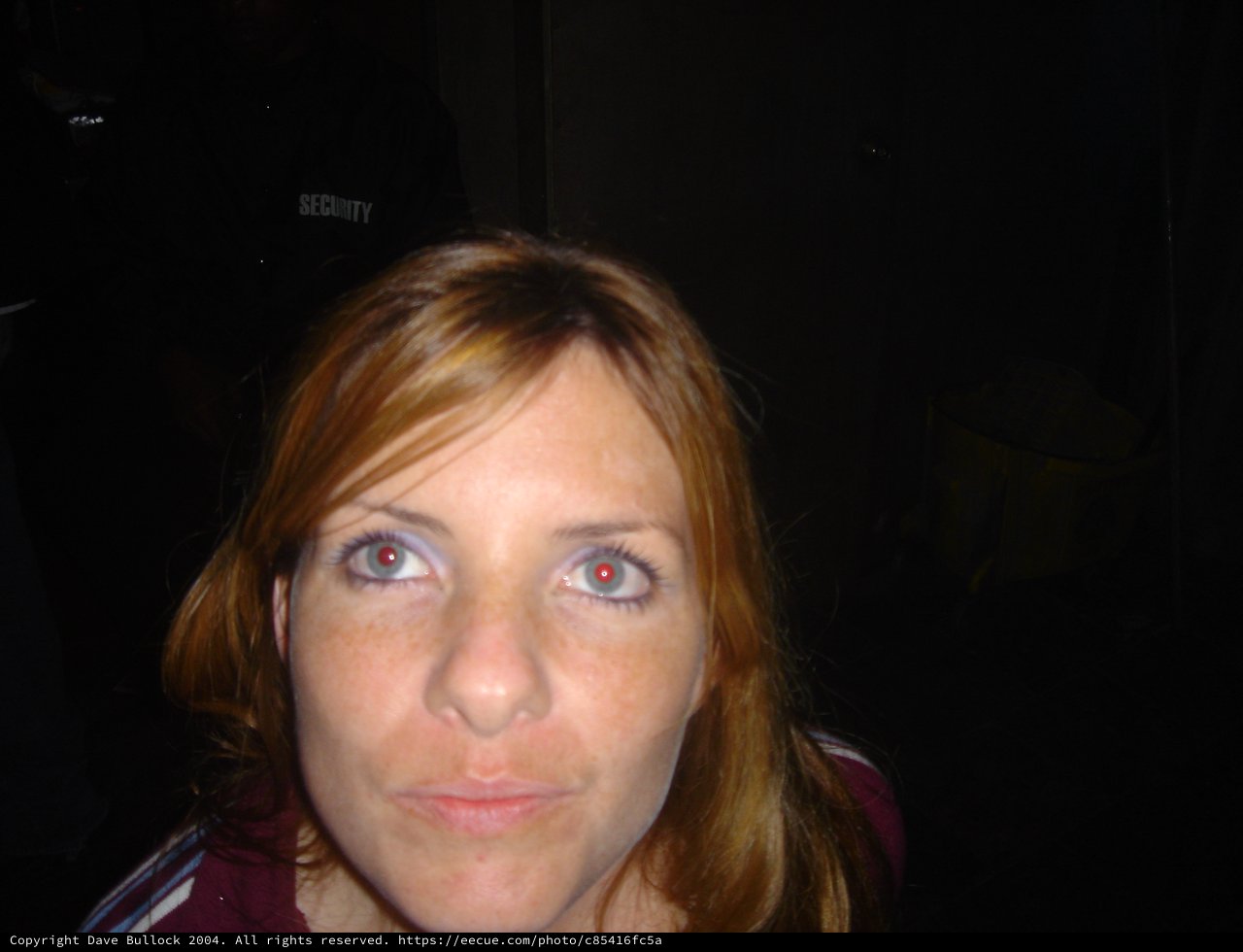 Candid Portrait with Red-Eye in Dark Venue