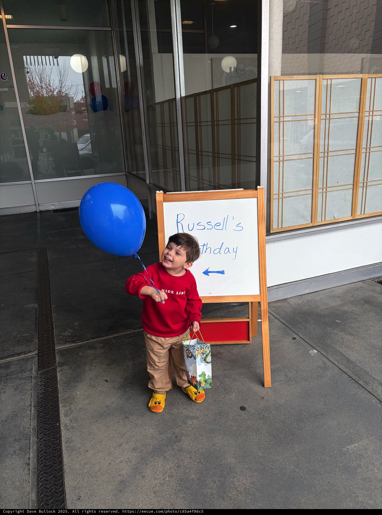 Russell's Birthday Celebration with Blue Balloon