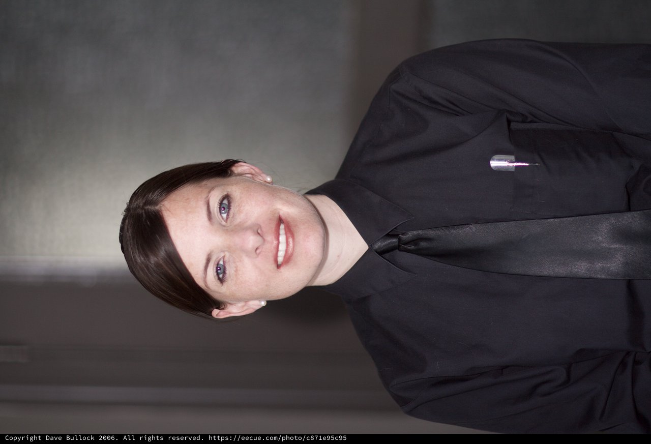 Professional Woman in Black Uniform Portrait 2006